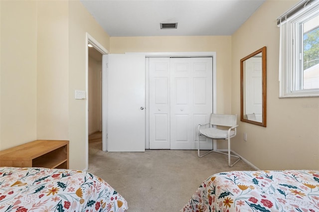 139 Adair Ave, Sarasota, FL 34243 - carpeted bedroom with a closet