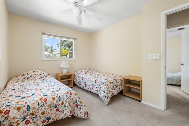 139 Adair Ave, Sarasota, FL 34243 - carpeted bedroom with a ceiling fan and baseboards
