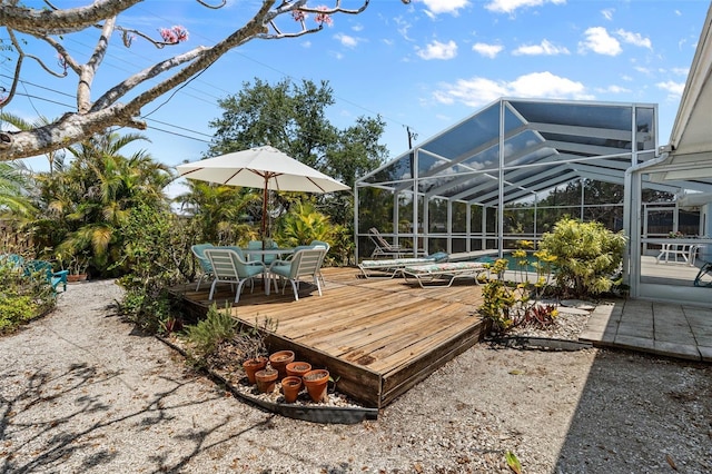 139 Adair Ave, Sarasota, FL 34243 - view of yard featuring a wooden deck, a lanai, and outdoor dining space