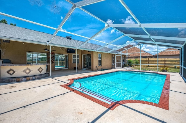 5742 39th Street Cir E, Bradenton, FL 34203 - view of pool featuring a patio area, a ceiling fan, and glass enclosure
