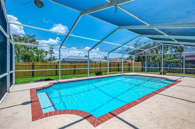 5742 39th Street Cir E, Bradenton, FL 34203 - view of swimming pool with a fenced backyard, a patio area, and a lanai