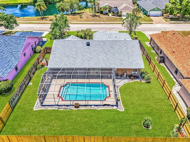 5742 39th Street Cir E, Bradenton, FL 34203 - aerial perspective of suburban area featuring a pool area and a nearby body of water