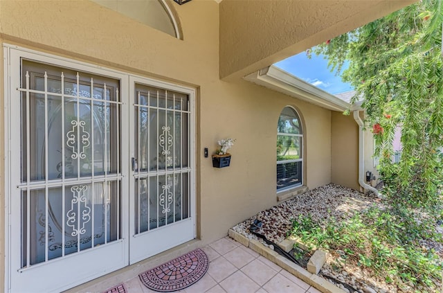 5742 39th Street Cir E, Bradenton, FL 34203 - property entrance with stucco siding