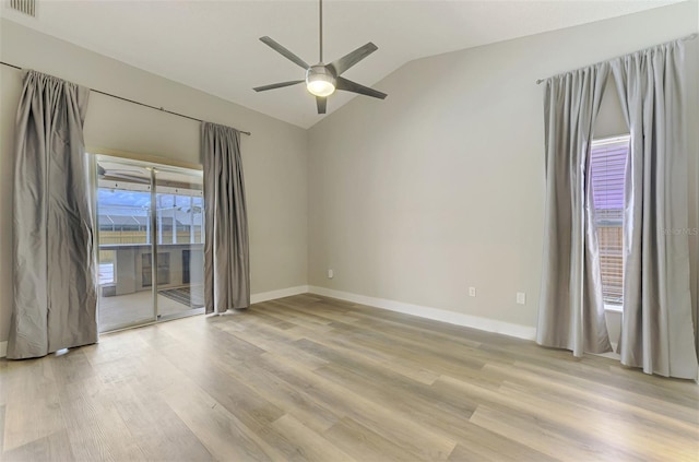 5742 39th Street Cir E, Bradenton, FL 34203 - unfurnished room featuring vaulted ceiling, a ceiling fan, light wood-type flooring, and baseboards