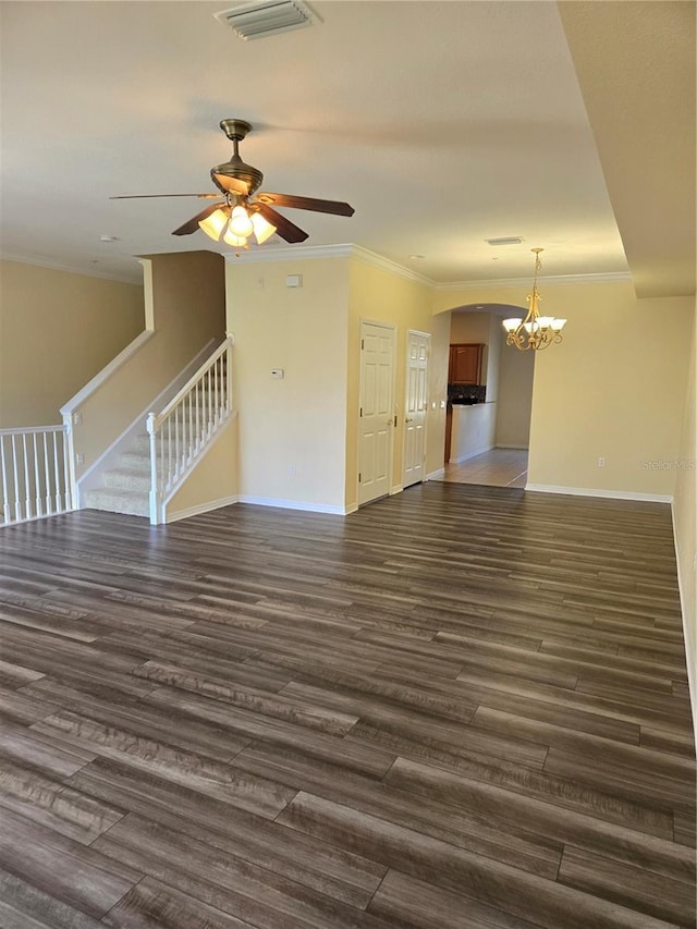 3409 10th Ln W, Palmetto, FL 34221 - unfurnished living room featuring a chandelier, dark wood-type flooring, baseboards, ornamental molding, and ceiling fan