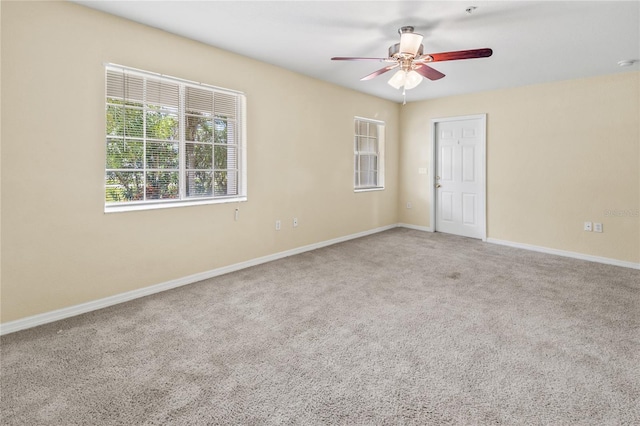 3409 10th Ln W, Palmetto, FL 34221 - spare room featuring ceiling fan, carpet, and baseboards