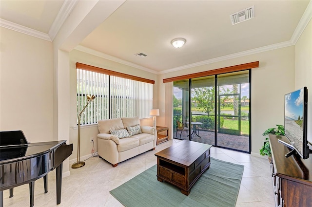 6756 Chester Trl, Lakewood Ranch, FL 34202 - living room with light tile patterned floors, ornamental molding, and baseboards