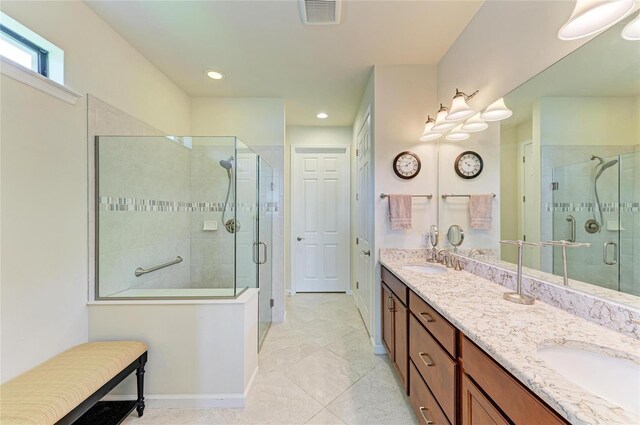 6756 Chester Trl, Lakewood Ranch, FL 34202 - bathroom with double vanity, a shower stall, recessed lighting, and baseboards