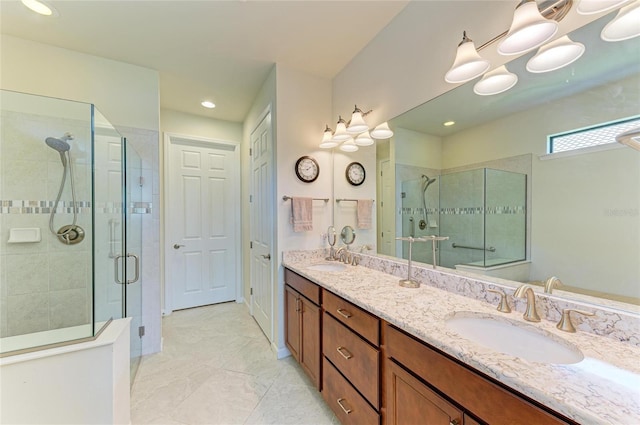 6756 Chester Trl, Lakewood Ranch, FL 34202 - bathroom with a stall shower, double vanity, and recessed lighting
