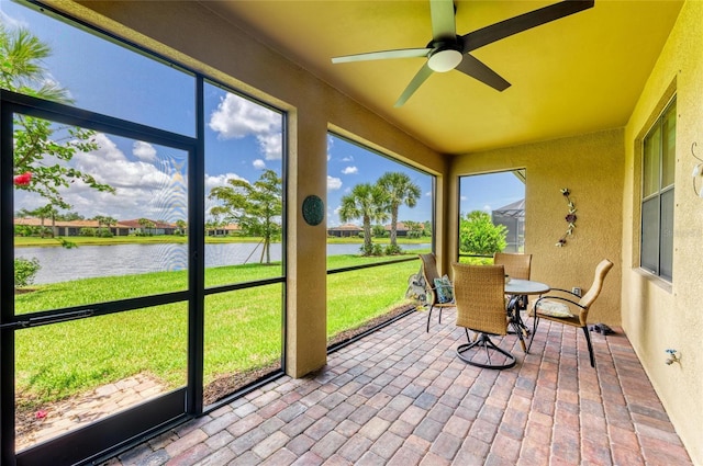 6756 Chester Trl, Lakewood Ranch, FL 34202 - sunroom / solarium featuring a water view, a ceiling fan, and outdoor dining space