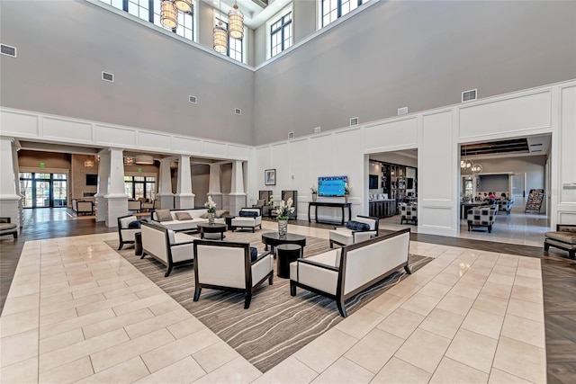 6756 Chester Trl, Lakewood Ranch, FL 34202 - common area with a high ceiling and a decorative wall