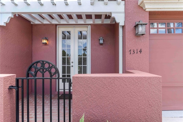 7314 Hamilton Rd, Bradenton, FL 34209 - entrance to property with french doors and stucco siding