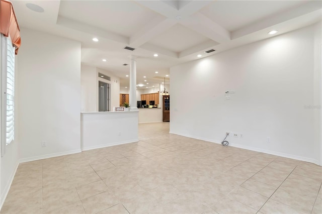 7314 Hamilton Rd, Bradenton, FL 34209 - unfurnished living room with ornate columns, beam ceiling, recessed lighting, coffered ceiling, and light tile patterned flooring