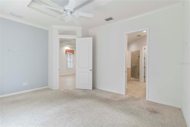 7314 Hamilton Rd, Bradenton, FL 34209 - unfurnished bedroom with ornamental molding, light colored carpet, light tile patterned floors, and connected bathroom