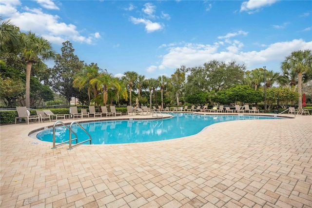 7314 Hamilton Rd, Bradenton, FL 34209 - community pool with a patio and view of scattered trees