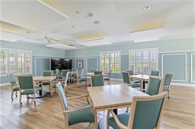 7314 Hamilton Rd, Bradenton, FL 34209 - dining room featuring a decorative wall, plenty of natural light, light wood-type flooring, a ceiling fan, and recessed lighting