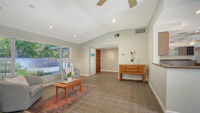 4771 Riverwood Cir, Sarasota, FL 34231 - tiled living area featuring ceiling fan, lofted ceiling, and recessed lighting