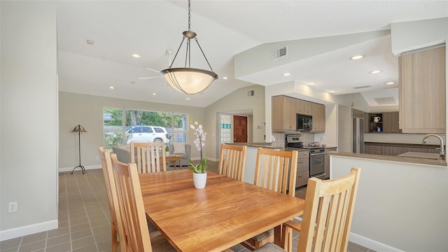 4771 Riverwood Cir, Sarasota, FL 34231 - dining room with lofted ceiling and recessed lighting