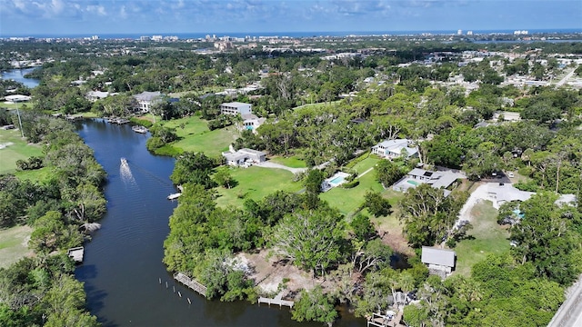 4771 Riverwood Cir, Sarasota, FL 34231 - aerial view of property and surrounding area with a nearby body of water and a tree filled landscape