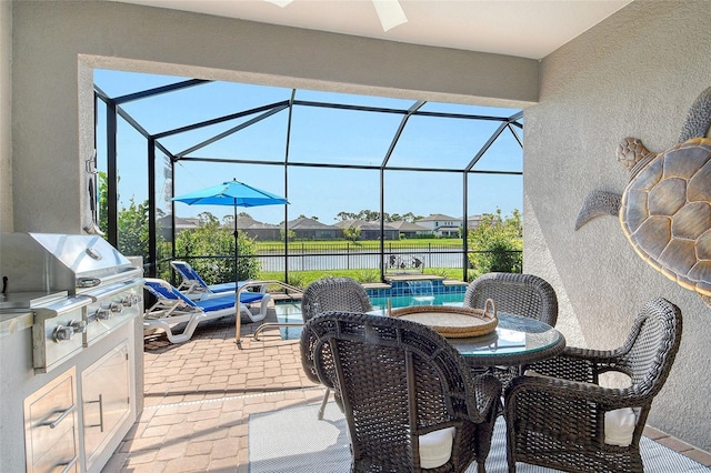 5475 Summit Gln, Bradenton, FL 34203 - view of patio / terrace featuring ceiling fan, a lanai, an outdoor pool, and a water view