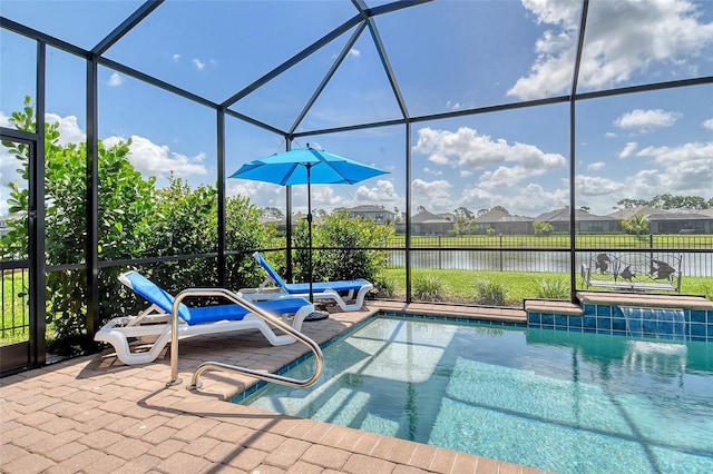 5475 Summit Gln, Bradenton, FL 34203 - view of swimming pool with a patio, a lanai, a water view, and a residential view