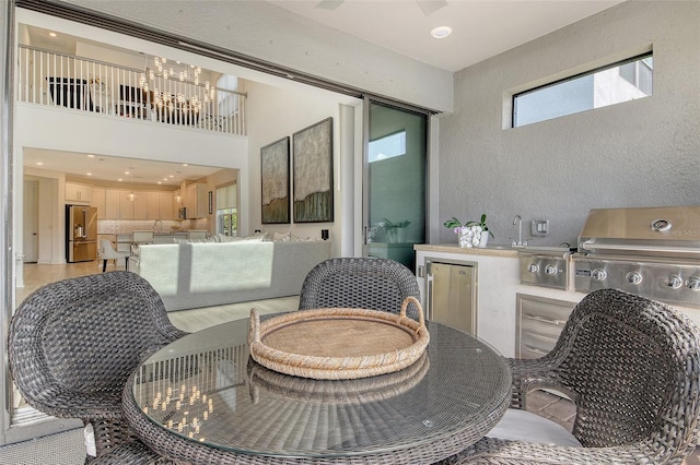 5475 Summit Gln, Bradenton, FL 34203 - view of patio / terrace with outdoor dining area, area for grilling, and a sink