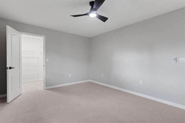 4473 Diamond Cir S, Sarasota, FL 34233 - empty room with carpet flooring, a ceiling fan, and baseboards