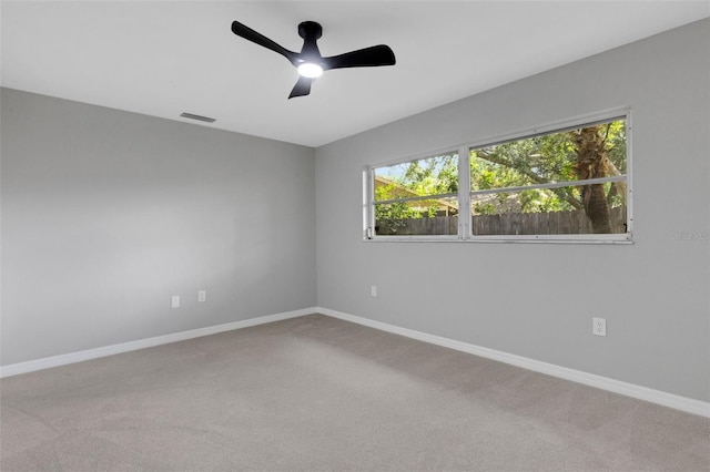 4473 Diamond Cir S, Sarasota, FL 34233 - carpeted spare room featuring baseboards and ceiling fan