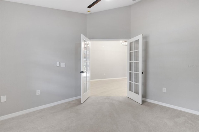 4473 Diamond Cir S, Sarasota, FL 34233 - carpeted spare room featuring french doors, a ceiling fan, and baseboards