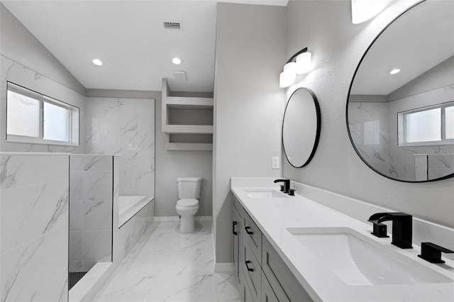 4473 Diamond Cir S, Sarasota, FL 34233 - bathroom featuring lofted ceiling, healthy amount of natural light, double vanity, toilet, and marble finish flooring