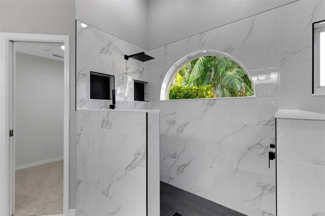 4473 Diamond Cir S, Sarasota, FL 34233 - full bath featuring a marble finish shower and baseboards