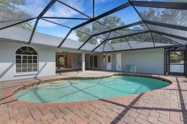 4473 Diamond Cir S, Sarasota, FL 34233 - swimming pool with a patio area and glass enclosure
