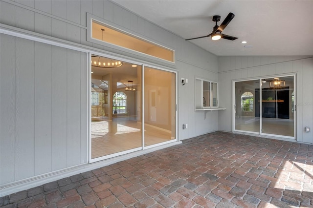 4473 Diamond Cir S, Sarasota, FL 34233 - unfurnished sunroom with ceiling fan and vaulted ceiling