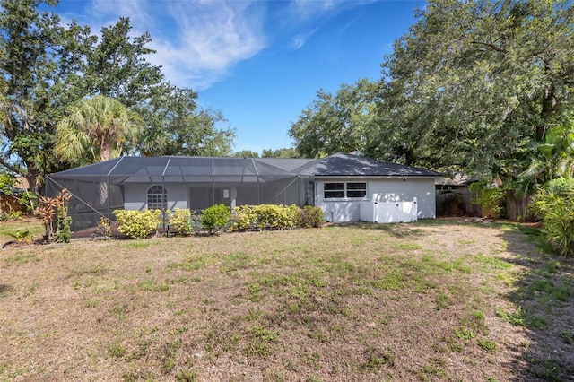 4473 Diamond Cir S, Sarasota, FL 34233 - rear view of house featuring glass enclosure