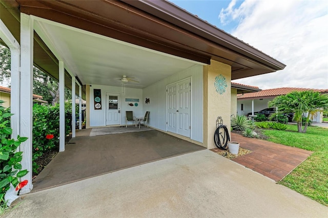 3213 Mercer Rd, Bradenton, FL 34207 - view of patio / terrace with a ceiling fan, a carport, and concrete driveway