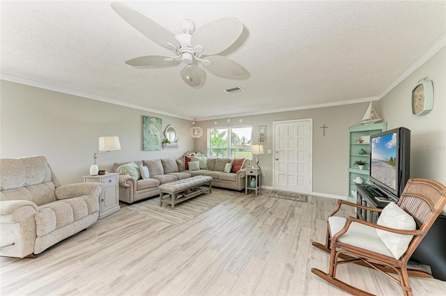 3213 Mercer Rd, Bradenton, FL 34207 - living area with light wood-style flooring, ceiling fan, ornamental molding, a textured ceiling, and baseboards