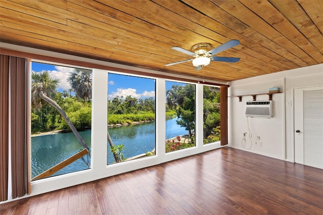 6406 Lincoln Rd, Bradenton, FL 34203 - unfurnished sunroom featuring a water view, a wall mounted air conditioner, and view of wooded area