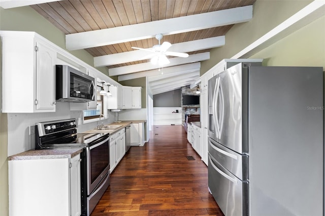 6406 Lincoln Rd, Bradenton, FL 34203 - kitchen featuring stainless steel appliances, dark wood-style flooring, white cabinets, ceiling fan, and wooden ceiling