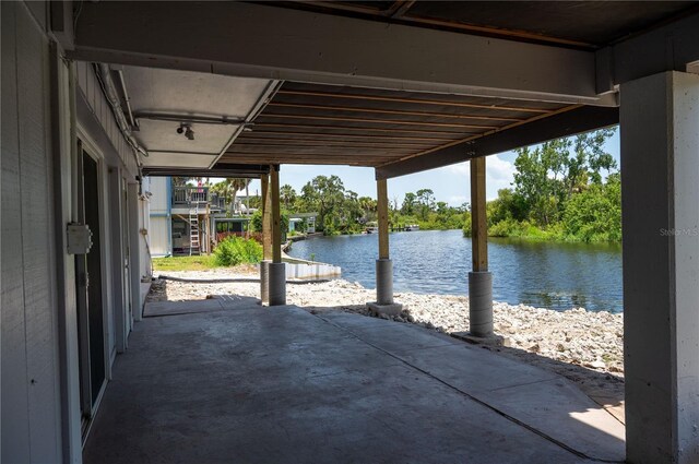 6406 Lincoln Rd, Bradenton, FL 34203 - view of patio / terrace with a water view and stairs