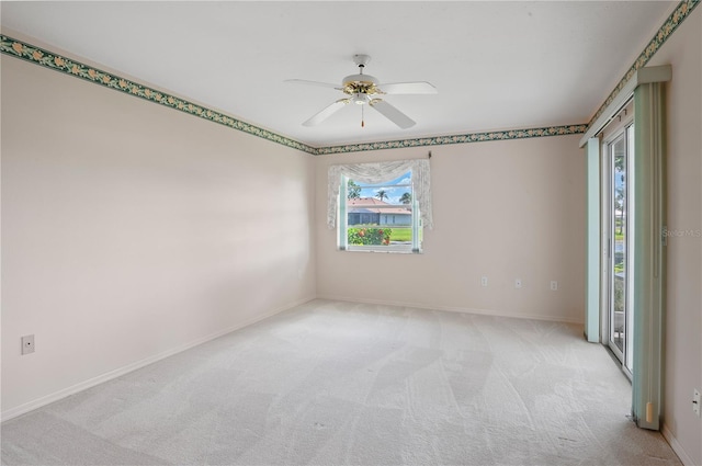 1654 Waxwing Ct, Venice, FL 34293 - empty room with ceiling fan, healthy amount of natural light, light carpet, and baseboards