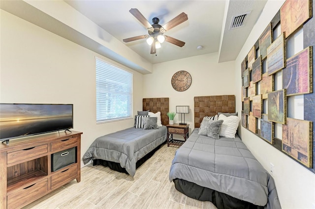 7911 Grand Estuary Trl Unit 102, Bradenton, FL 34212 - bedroom with light wood-style floors and a ceiling fan