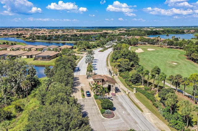 7911 Grand Estuary Trl Unit 102, Bradenton, FL 34212 - aerial view of a large body of water, a golf club, and a tree filled landscape
