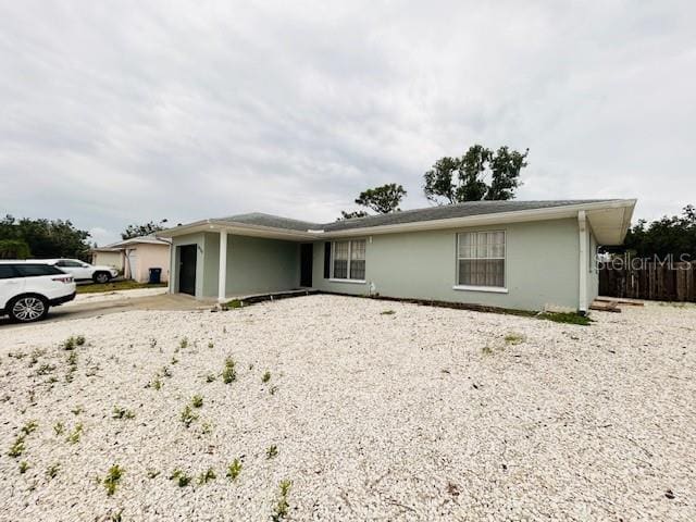 8409 43rd Ave W, Bradenton, FL 34209 - single story home with driveway, a garage, and stucco siding