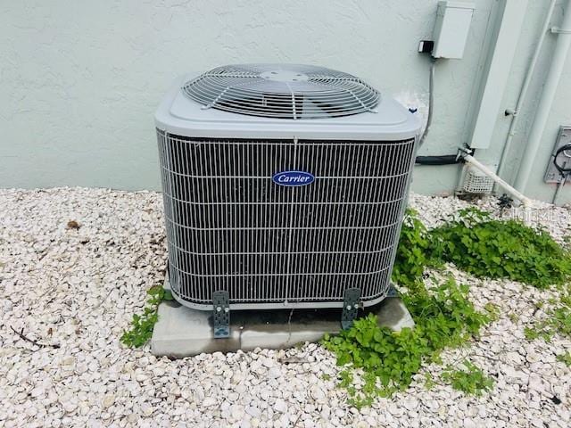 8409 43rd Ave W, Bradenton, FL 34209 - exterior view of central air condition unit and stucco siding