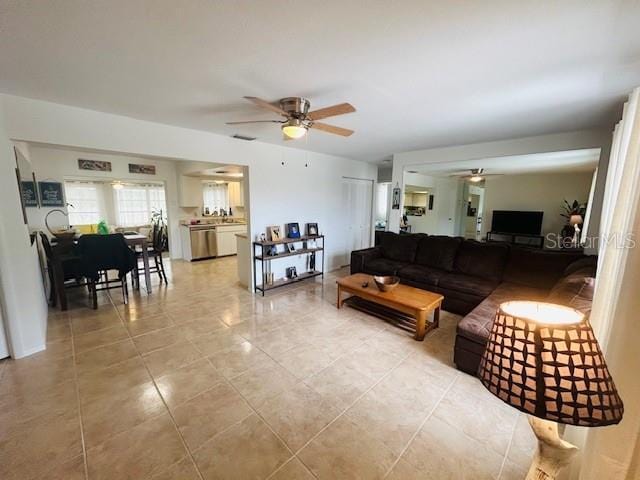 8409 43rd Ave W, Bradenton, FL 34209 - living area featuring ceiling fan and light tile patterned floors