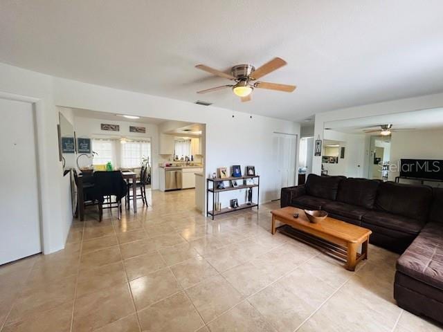 8409 43rd Ave W, Bradenton, FL 34209 - living area with ceiling fan and light tile patterned floors