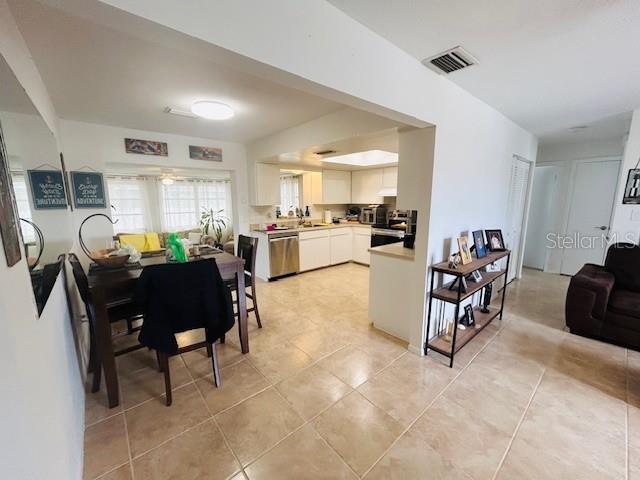 8409 43rd Ave W, Bradenton, FL 34209 - dining room with light tile patterned flooring
