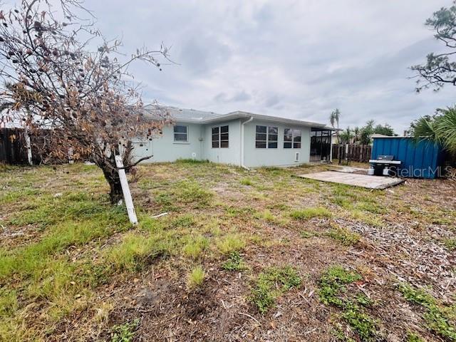 8409 43rd Ave W, Bradenton, FL 34209 - rear view of property with a patio