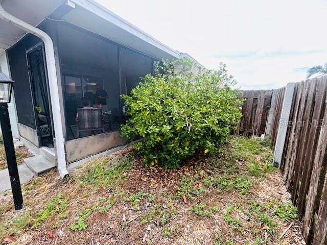 8409 43rd Ave W, Bradenton, FL 34209 - view of yard featuring a sunroom