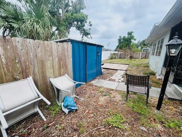 8409 43rd Ave W, Bradenton, FL 34209 - fenced backyard featuring a patio area